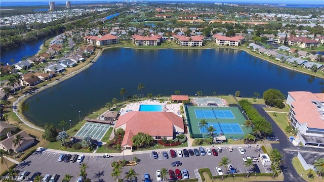 birds eye view of property featuring a water view