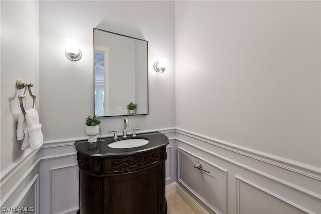 bathroom featuring tile flooring and large vanity