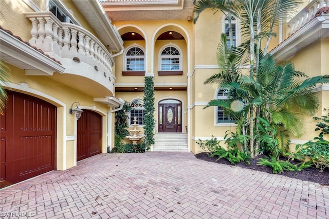 property entrance with a garage