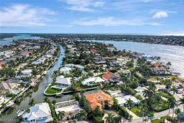 drone / aerial view with a water view