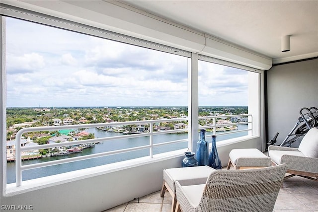 balcony featuring a water view