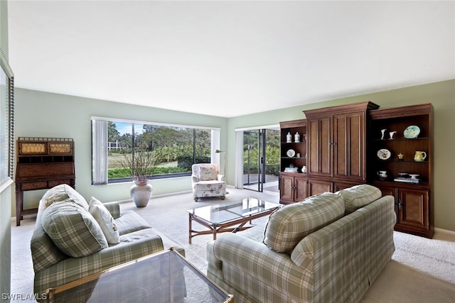 living room with light colored carpet