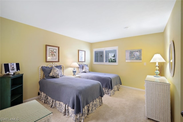 bedroom with light colored carpet