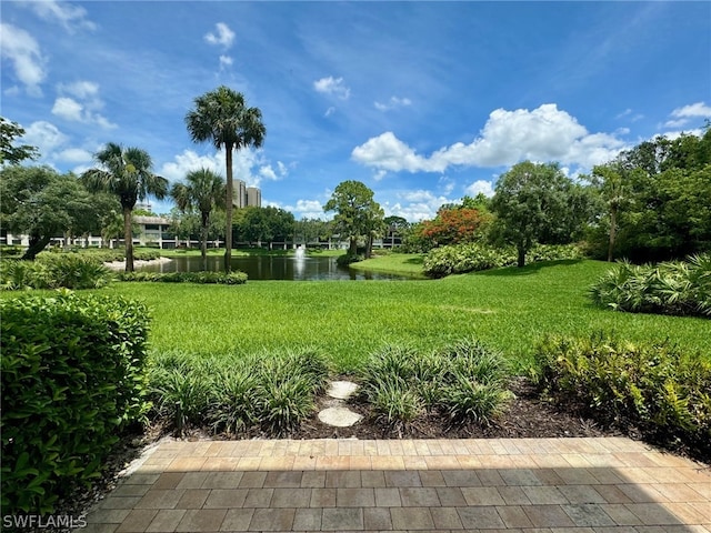 view of yard with a water view