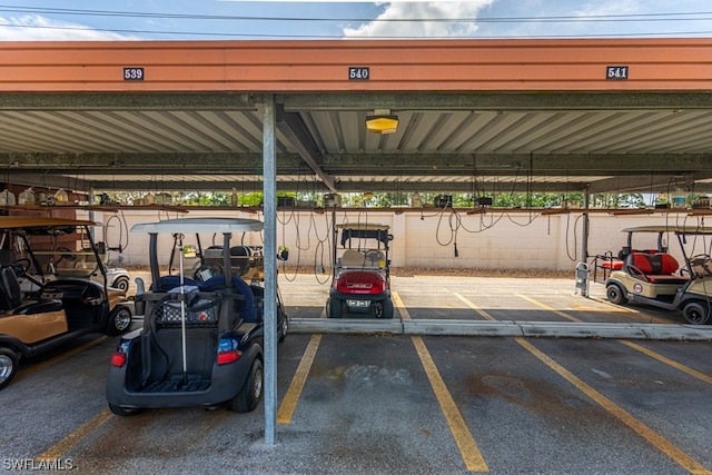 garage featuring a carport