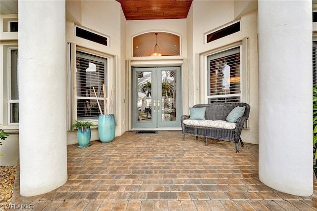 property entrance featuring french doors