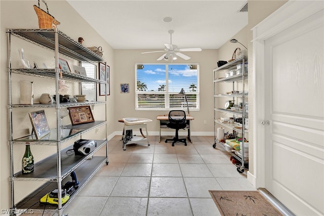 tiled office with ceiling fan