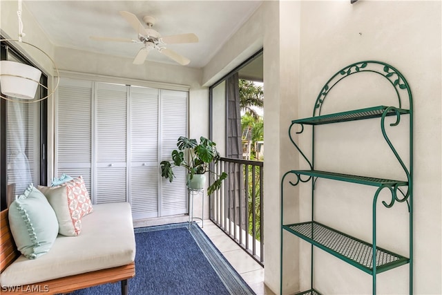 sunroom / solarium with ceiling fan