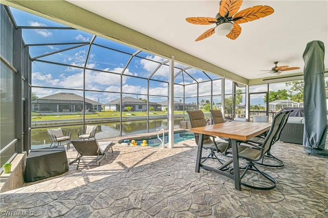 sunroom with a water view