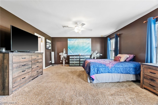 bedroom featuring ceiling fan and carpet floors