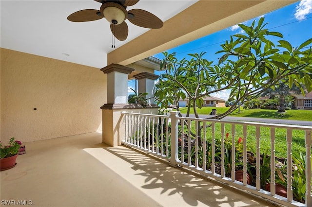 balcony featuring ceiling fan