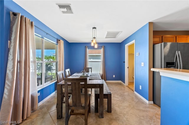 view of tiled dining room