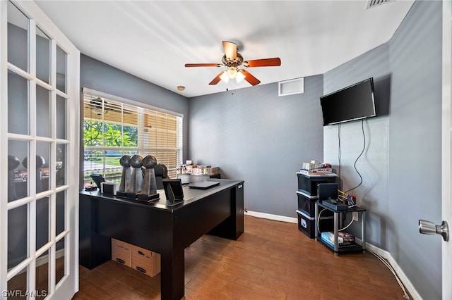 office area with ceiling fan and hardwood / wood-style floors