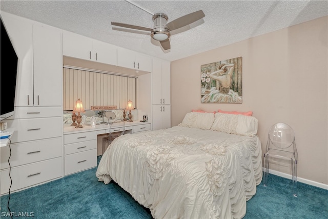 carpeted bedroom featuring a textured ceiling and ceiling fan