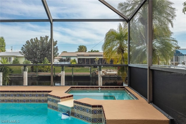 view of pool featuring a lanai