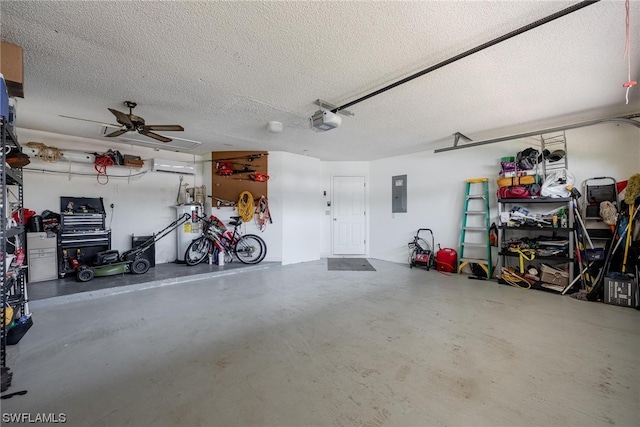 garage featuring electric panel, ceiling fan, and a garage door opener