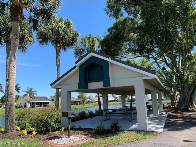 view of home's community featuring a gazebo and a water view