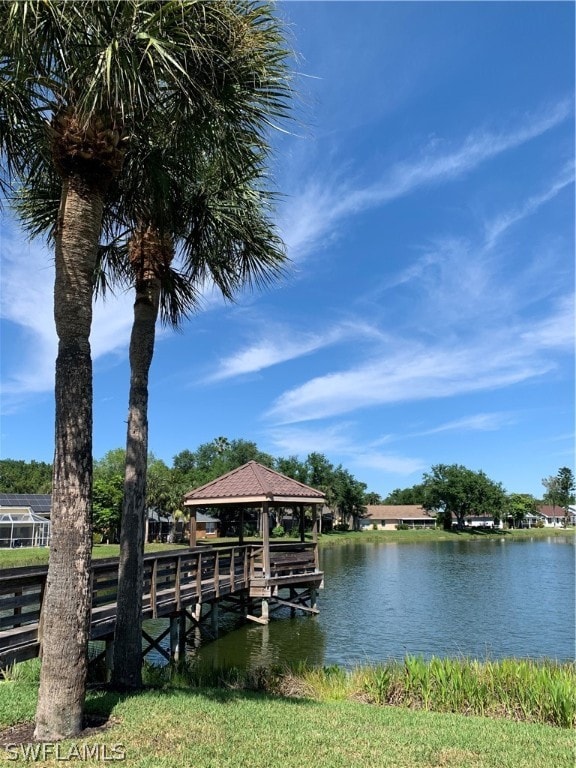 dock area with a water view and a gazebo