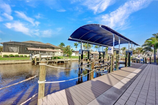 dock area with a water view