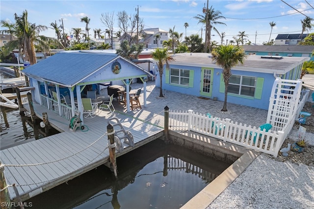 view of dock with a patio