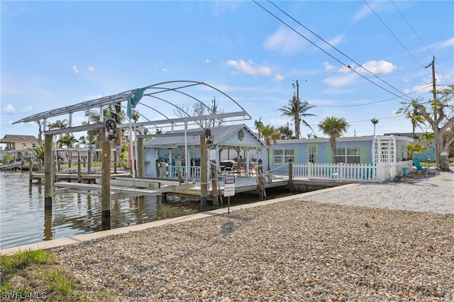 dock area with a water view