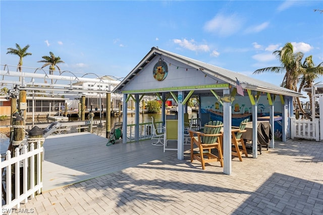 deck featuring a water view