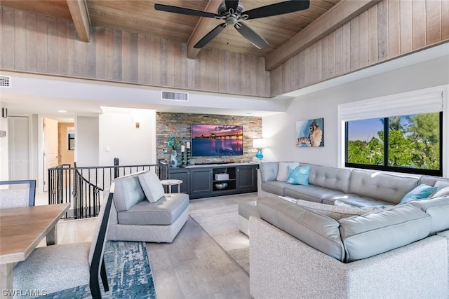 living room with light hardwood / wood-style flooring, ceiling fan, wooden ceiling, and beamed ceiling