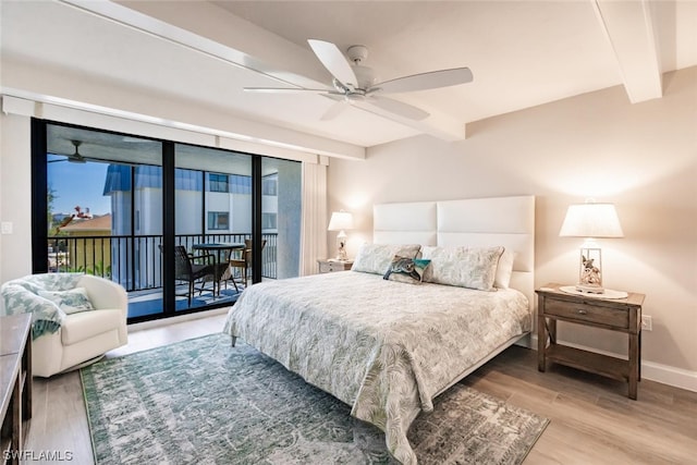 bedroom featuring beam ceiling, light hardwood / wood-style floors, ceiling fan, and access to outside