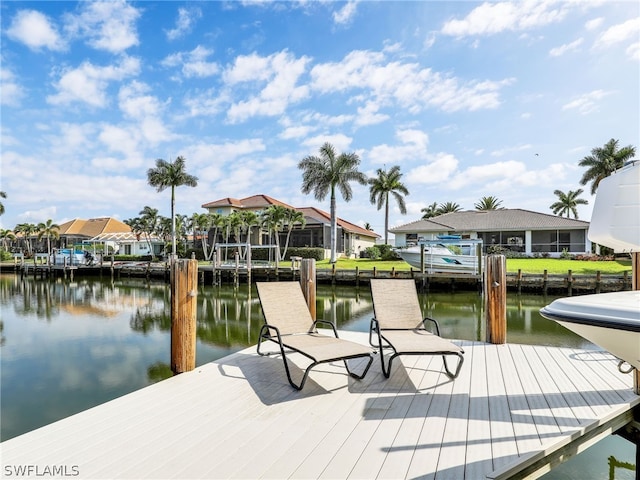 dock area with a water view