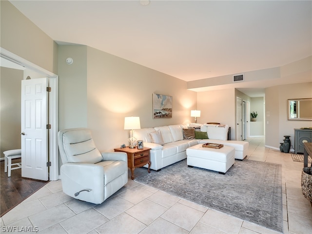 living room with light hardwood / wood-style flooring