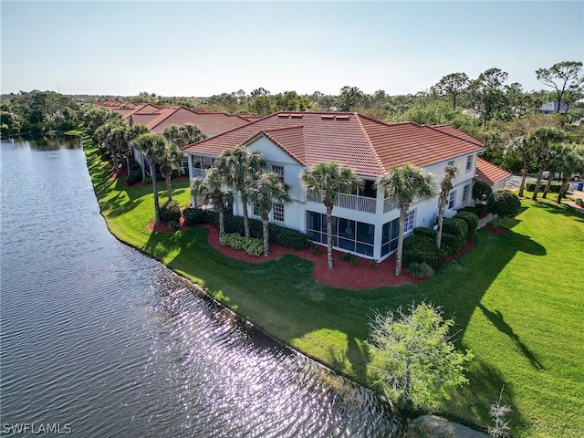 birds eye view of property featuring a water view