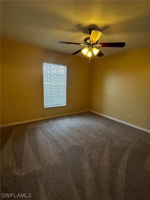 unfurnished room featuring carpet and ceiling fan