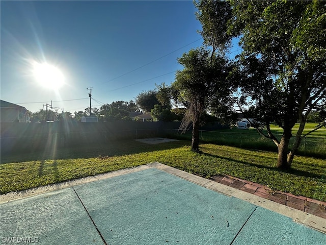 exterior space with a patio area and a yard