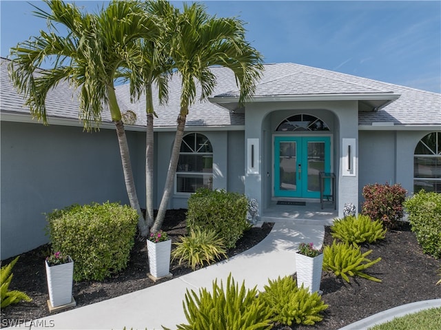 property entrance featuring french doors