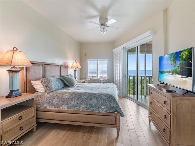 bedroom with access to exterior, ceiling fan, and light wood finished floors