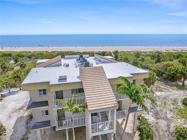 aerial view with a view of the beach and a water view