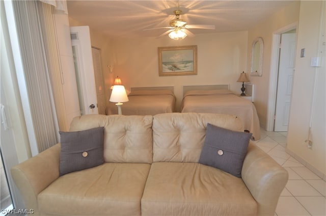 bedroom with tile flooring and ceiling fan