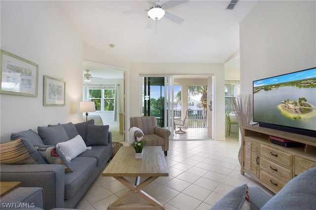 4690 Hawks Nest Way Unit E-204, Naples, FL 34114 - living area with a ceiling fan, light tile patterned floors, and high vaulted ceiling