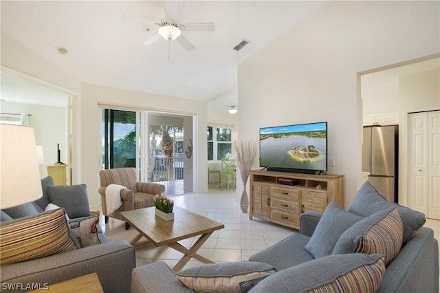 4690 Hawks Nest Way Unit E-204, Naples, FL 34114 - living area with light tile patterned floors, a ceiling fan, and high vaulted ceiling