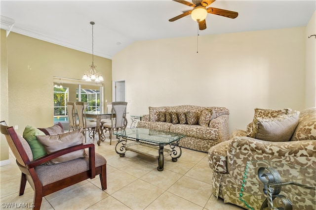 living room with light tile floors, lofted ceiling, and ceiling fan with notable chandelier