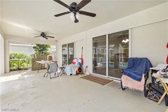 view of terrace featuring ceiling fan