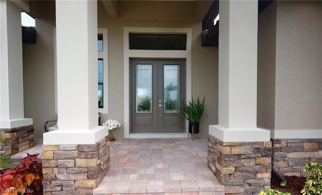 entrance to property featuring french doors