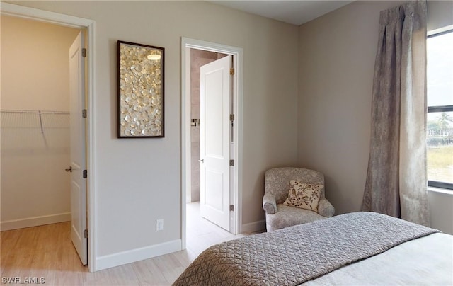 bedroom featuring light wood-type flooring