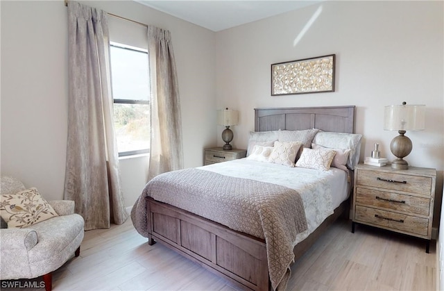 bedroom featuring light hardwood / wood-style floors