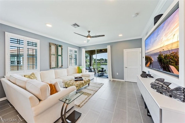 living room featuring ceiling fan and ornamental molding