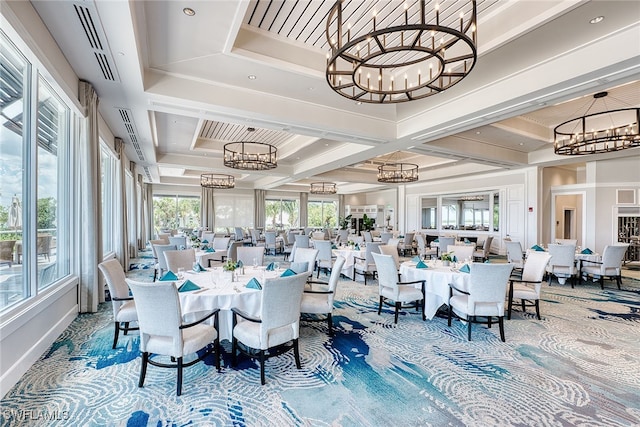 dining area with beamed ceiling, a notable chandelier, and coffered ceiling