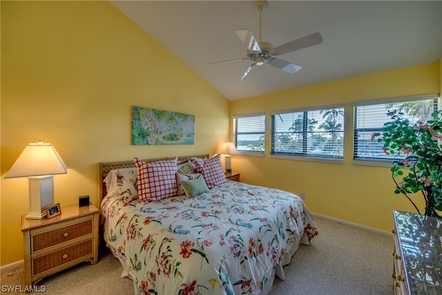 bedroom featuring light carpet, ceiling fan, and vaulted ceiling