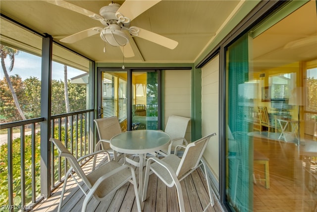 sunroom / solarium with ceiling fan