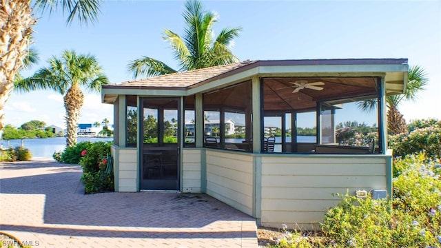 exterior space with a water view