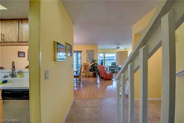 hallway with light wood-type flooring